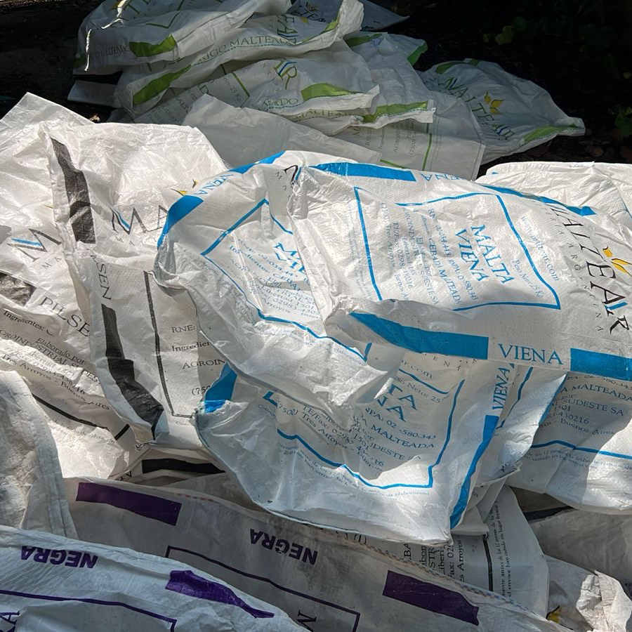 Malt sacks arriving from the brewery, before any cutting