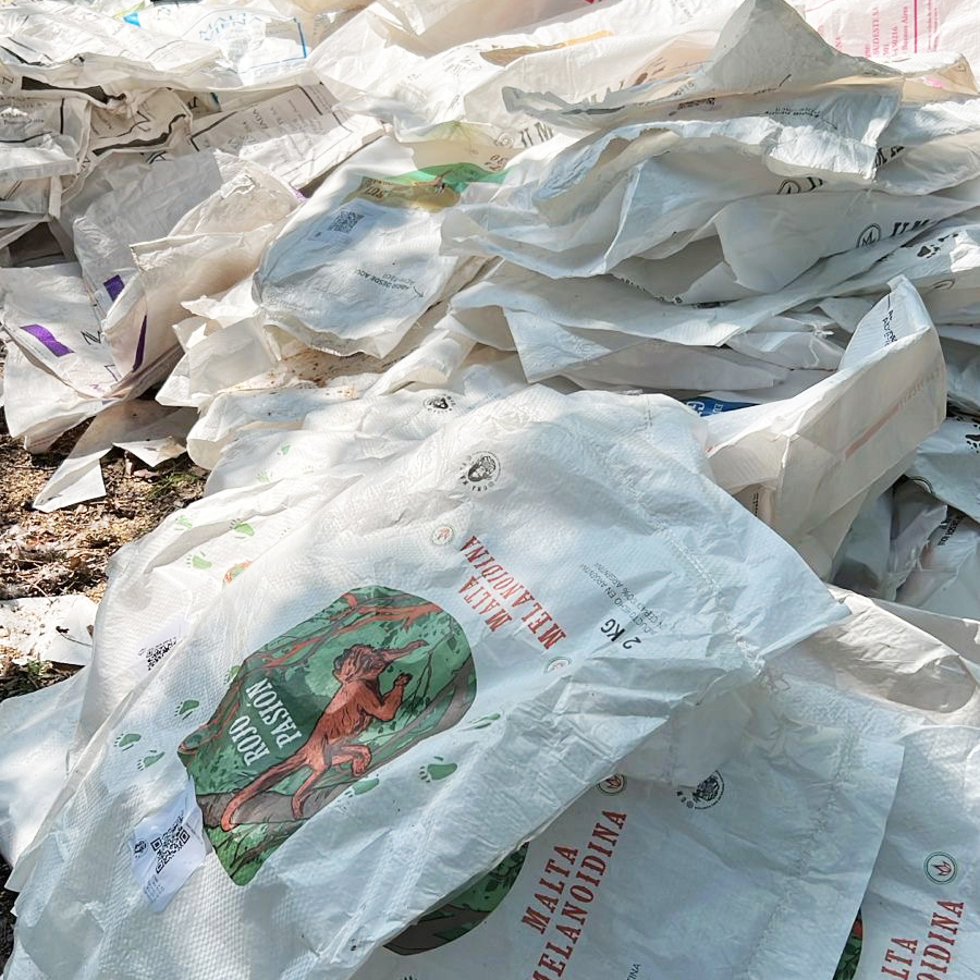 The weave and the print, still legible on the sack